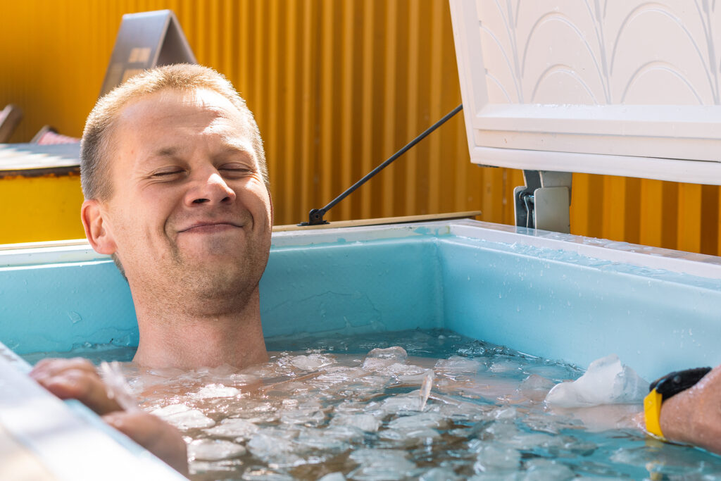 man in ice bath for cold plunge